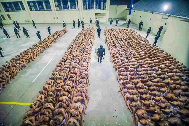 Photos Of Prisoners Stripped Half Naked Sitting Tightly In Lines