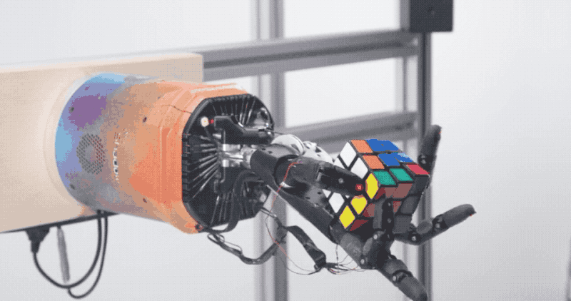 extremely dextrous robot arm uses AI to solve rubiks cube 