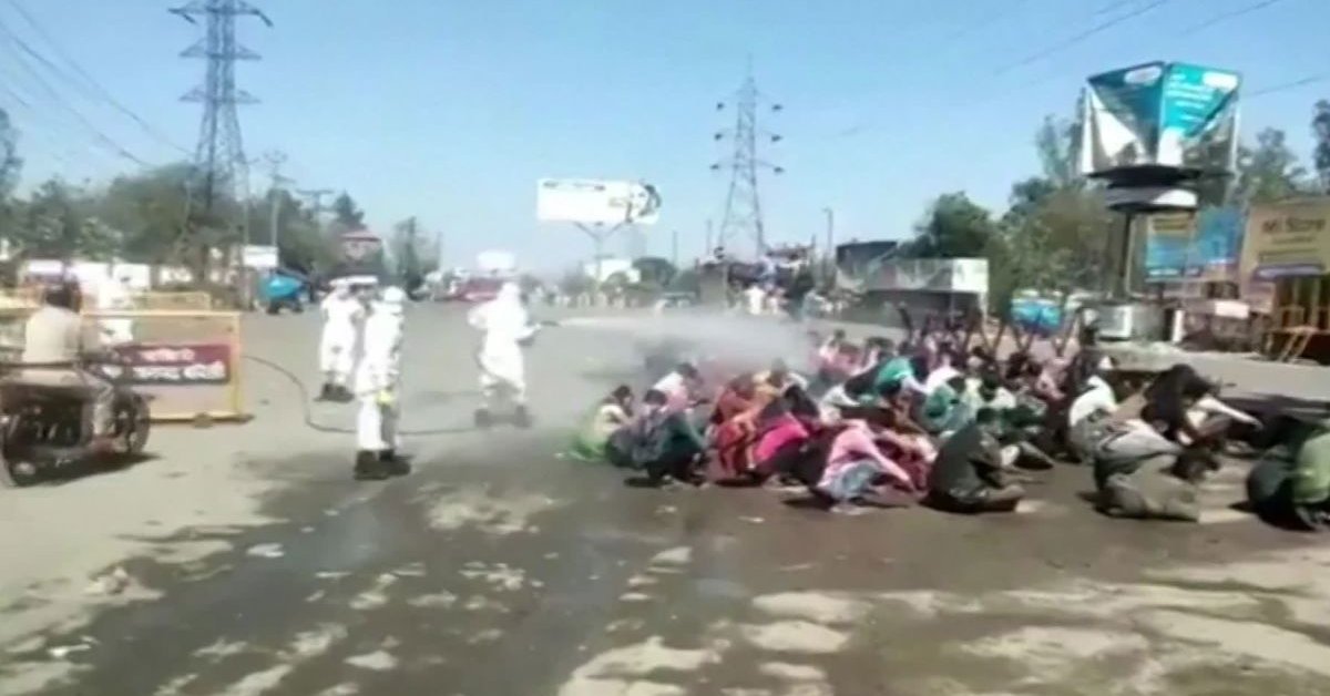 Poor Migrant Workers Sprayed With Chemical Solutions To Fight CO.VID-19, What An Inhuman Act It Is!