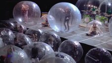 Performers And Audience Sealed In Plastic Bubble During A Concert