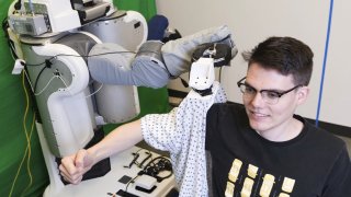 Georgia Tech: This Robot Can Help A Human Get Dressed In The Future