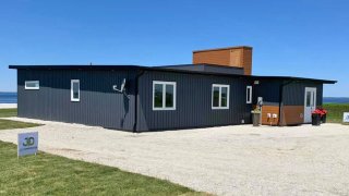 This House Is Built From 612,000 Plastic Bottles And Can Survive 525Km/h Winds