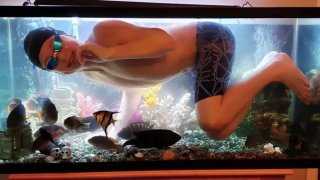 Amid COVID-19 Lockdown, Kid Hilariously Uses Dad’s Fish Tank As A Swimming Pool
