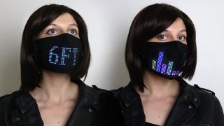 This LED Face Mask Will Alert Other People To Stay 2 Meters Away From You