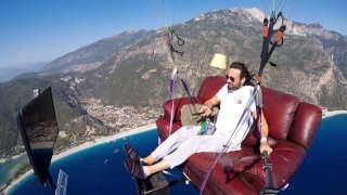 Man Flies Sitting On A Couch Watching TV, Giving The Public Quite A Scare