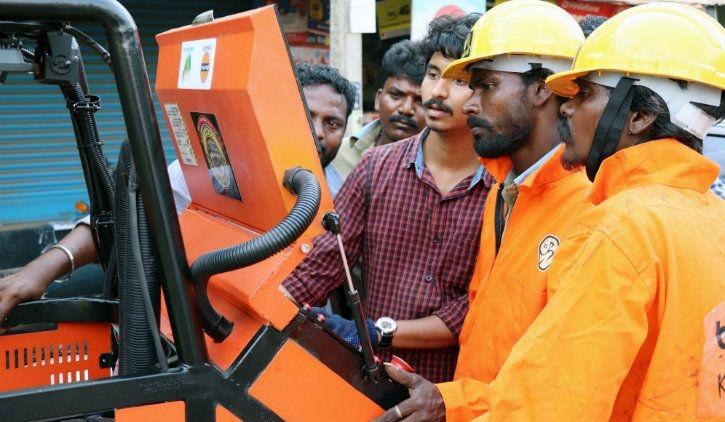 Team GenRobotics training sanitation workers in Kerala