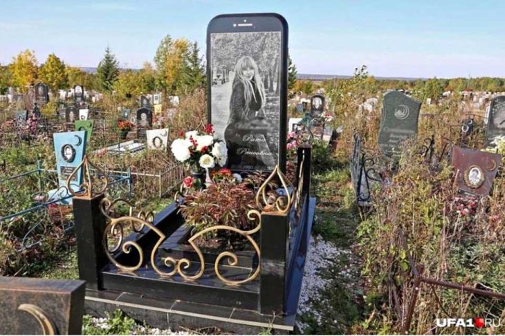 Image result for A giant iPhone stele in Russia's cemetery