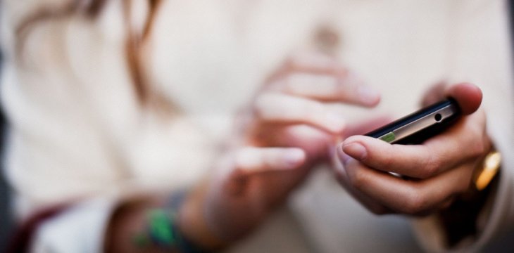 O Woman Holding Phone With Facebook Facebook1 1024