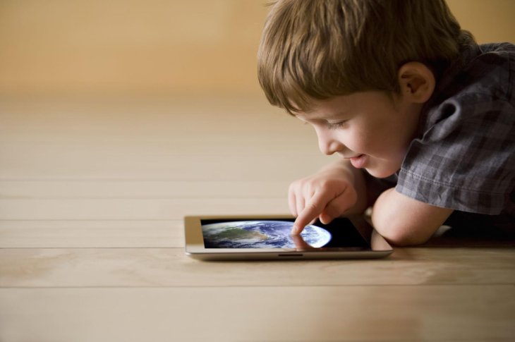 Kid Playing Ipad