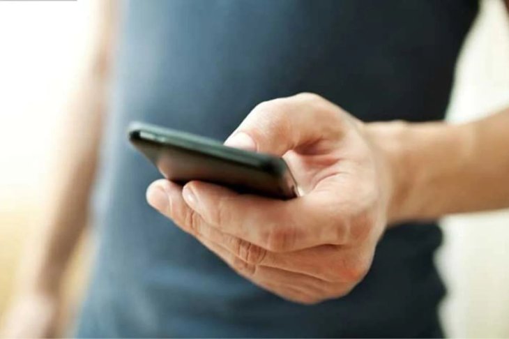 man holding a phone
